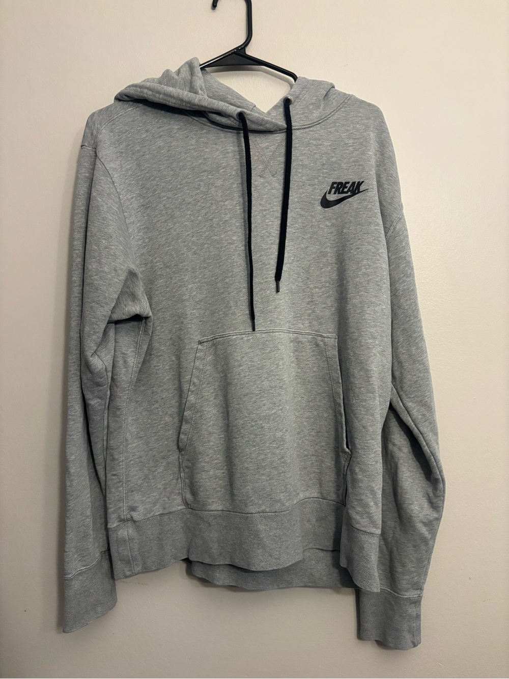 Nike Gray Pullover Hoodie with Black Drawstrings & Chest Logo